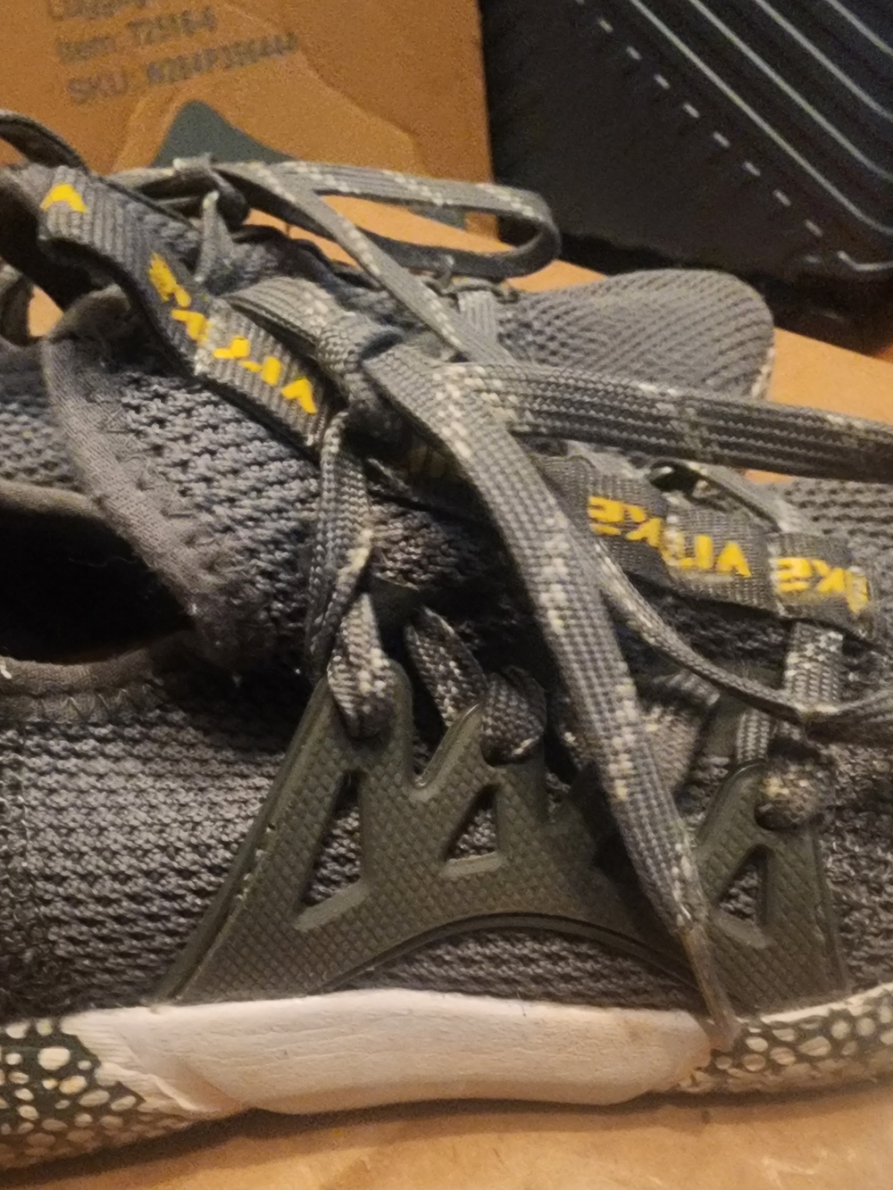 Gray Athletic Sneakers with Yellow Accent